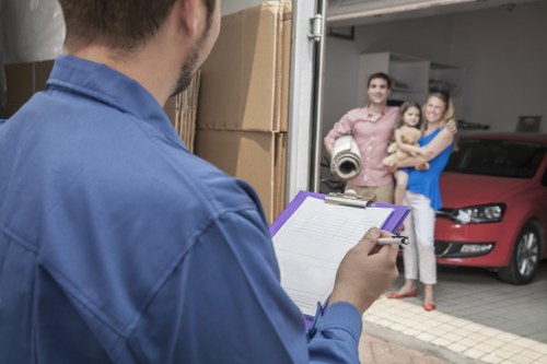 Professional team removing a bed from a home