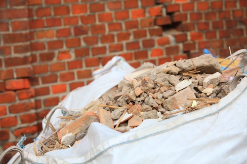 Stacked bed frames ready for recycling