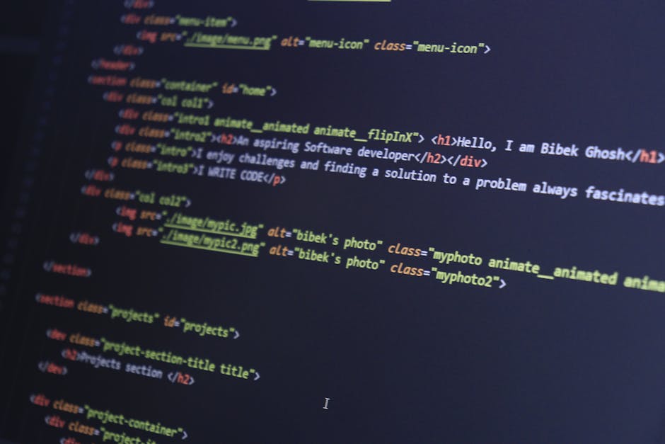 Close-up view of a computer screen displaying lines of HTML code with tags in pink, yellow, and green text on a dark background. The code includes elements such as list items, anchor tags with hyperli